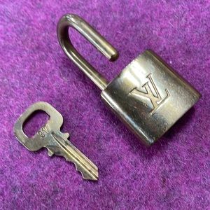 # 317 Authentic LOUIS VUITTON MADE IN PARIS SIGNATURE Lock & Key in Gold Brass